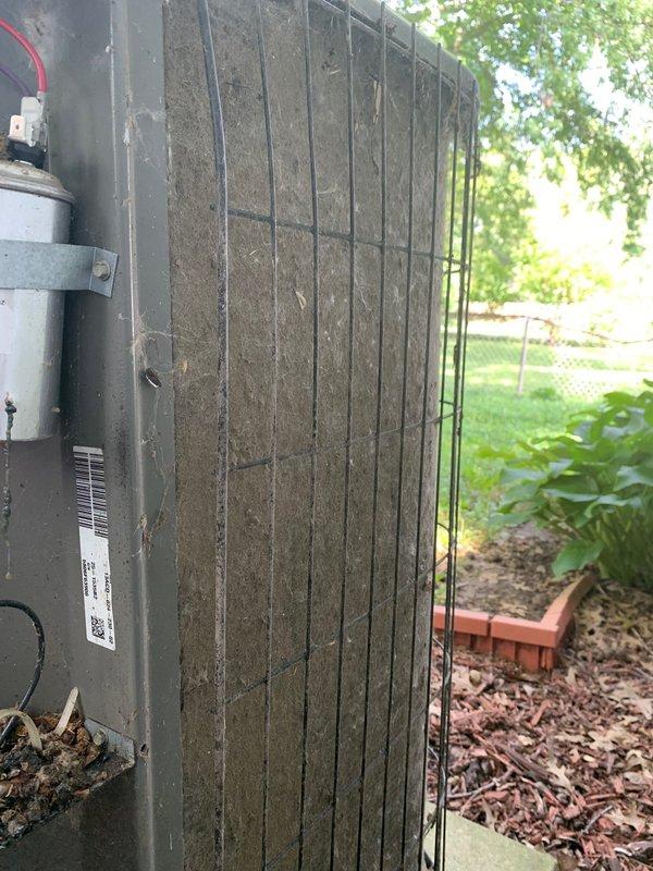 Responded to no cooling complaint on 14-year-old outdoor condensing unit reported to be blowing warm air. Upon arrival, performed diagnostic inspection and discovered severely clogged air filter with heavy dirt and debris accumulation restricting airflow. Inspected refrigerant lines for leaks or damage, noting weathered line insulation and minor surface corrosion on copper piping but no active refrigerant leaks detected. Replaced dirty filter with new unit, verified proper airflow restoration, and tested system operation. Unit returned to normal cooling function after filter replacement. Advised ongoing maintenance requirements for aging equipment.