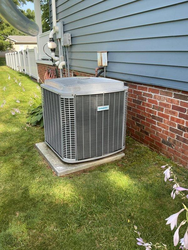 Completed comprehensive cooling maintenance tune-up on 15-year-old residential air conditioning system. System was operating properly upon arrival; performed standard preventive maintenance procedures including inspection of outdoor condensing unit, verification of thermostat operation and calibration, and photographic documentation of equipment condition. All components found functioning within normal parameters with no immediate repairs required.