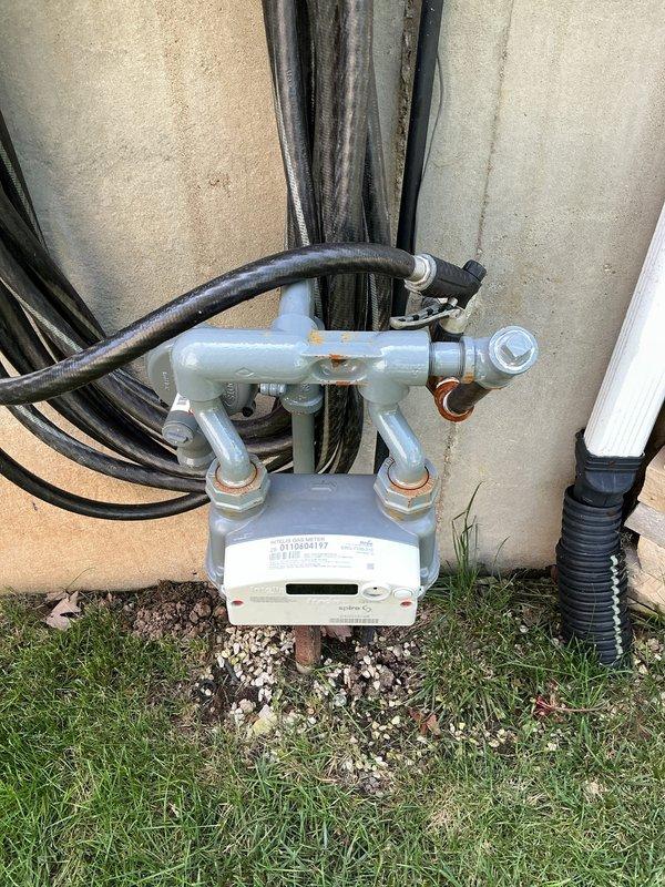 Responded to callback for dual 50-gallon gas water heater installation where units failed to ignite following previous day's installation. Upon arrival, performed diagnostic testing on both water heaters including gas supply verification at meter and moisture detection readings on tank assemblies. Troubleshot ignition system failures, verified proper gas line connections and pressure, and successfully restored hot water service to both units. Applied required permit identification stickers to water heaters per municipal requirements.