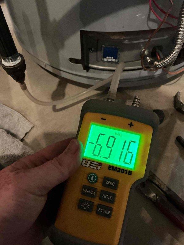Responded to callback for dual 50-gallon gas water heater installation where units failed to ignite following previous day's installation. Upon arrival, performed diagnostic testing on both water heaters including gas supply verification at meter and moisture detection readings on tank assemblies. Troubleshot ignition system failures, verified proper gas line connections and pressure, and successfully restored hot water service to both units. Applied required permit identification stickers to water heaters per municipal requirements.