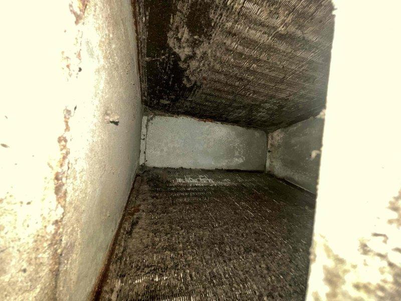 Responded to no cooling complaint on two residential HVAC units over 10 years old. Upon inspection, discovered extensive mold and mildew contamination throughout air handler compartments and ductwork, with significant moisture damage, rust staining, and biological growth on metal surfaces. Documented severe deterioration of interior components including corroded ductwork, peeling paint, and compromised insulation materials. Advised customer that the warm air issue is compounded by contaminated air distribution system requiring professional duct cleaning and remediation before normal cooling operations can resume. Recommended system evaluation for moisture intrusion sources and potential air handler replacement due to age and condition of equipment.