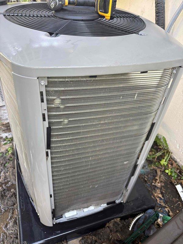 Responded to no-cool service call for ground-mounted outdoor condenser unit at Home Depot location. Upon arrival, confirmed customer complaint that fan was not engaging and system was not providing cooling. Performed diagnostic inspection of unit, removed service panel to access internal components, and assessed condenser coil condition which showed moderate accumulation of dirt and debris on aluminum fins. Completed necessary repairs to restore fan operation and cooling function, ensured unit was operating properly before departure per customer's special instructions to leave fan running with AC turned off.
