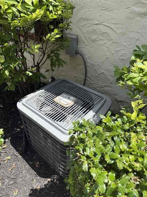 Replaced failed blower motor assembly (CFM) on outdoor condensing unit. Removed old blower wheel and motor showing significant dust accumulation, installed new assembly, and verified proper operation. Old components disposed of per protocol.
