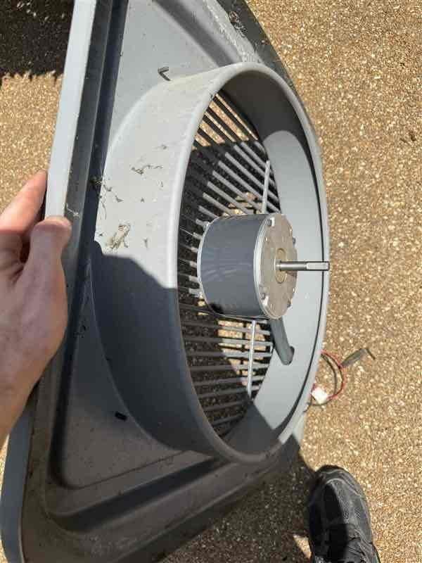 Replaced failed blower motor assembly (CFM) on outdoor condensing unit. Removed old blower wheel and motor showing significant dust accumulation, installed new assembly, and verified proper operation. Old components disposed of per protocol.