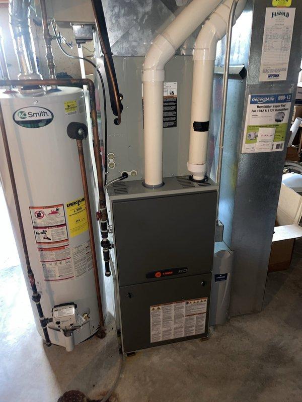 Responded to follow-up service call for frozen air conditioning unit. Performed diagnostic evaluation of system to identify cause of freezing condition. Documented equipment condition with photos showing furnace, ductwork, and air filtration components. Provided diagnostic findings to customer and advised that necessary repairs would require additional authorization to proceed.