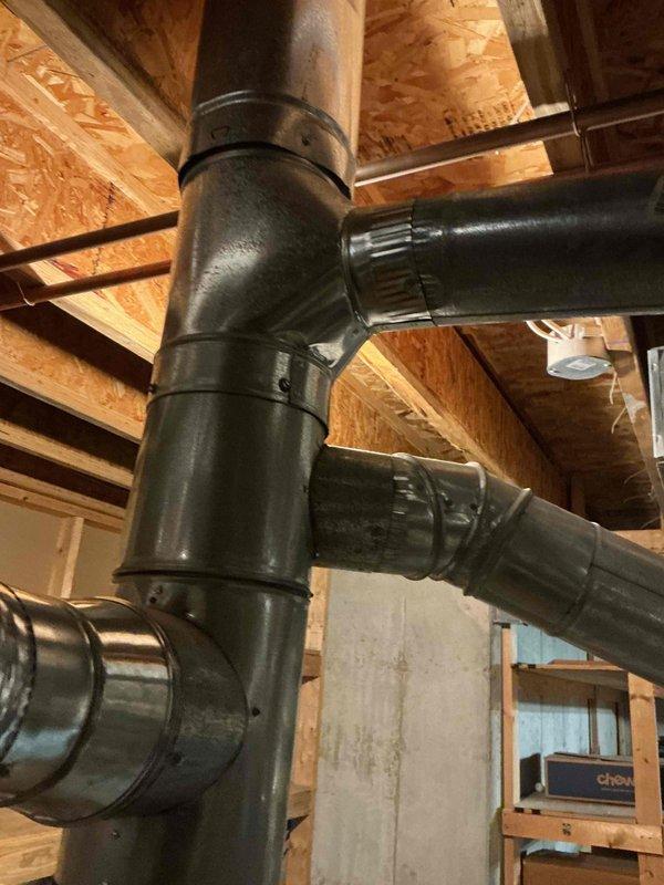 Responded to service call for no pilot light on one of two tanked water heaters in basement. Upon inspection, determined existing unit was beyond economical repair. Installed new 75-gallon gas tall water heater as replacement. Connected gas supply line, installed new temperature and pressure relief valve with discharge piping to code, and established proper venting through existing ductwork system. Integrated unit into existing plumbing infrastructure with appropriate shut-off valves and unions for future serviceability. Tested all connections for leaks, verified proper combustion and venting, and confirmed adequate hot water delivery to fixtures throughout home. Unit operational and performing to manufacturer specifications upon completion.