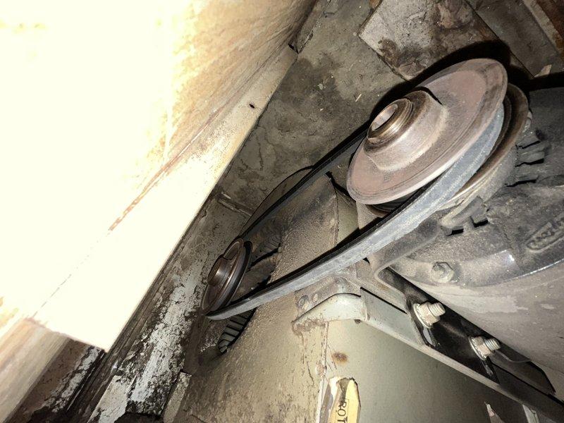 Responded to no cooling complaint on 30+ year old residential air conditioning system for second opinion diagnostic evaluation. Upon arrival, performed comprehensive system inspection of outdoor condenser unit and indoor components. Visual examination revealed severely aged equipment with belt-driven blower assembly showing significant wear, deterioration, and dust accumulation. Condenser unit exterior showed weathering consistent with age, though mechanically accessible for evaluation. Assessed overall system condition including electrical connections, refrigerant lines, and mechanical components. Due to advanced age of equipment (30+ years beyond typical service life), system exhibits multiple signs of end-of-life deterioration including worn pulley system, aged belt drive mechanism, and general component degradation. Documented equipment condition with photographic evidence of outdoor unit installation and indoor blower assembly. Provided diagnostic findings and recommendations to s