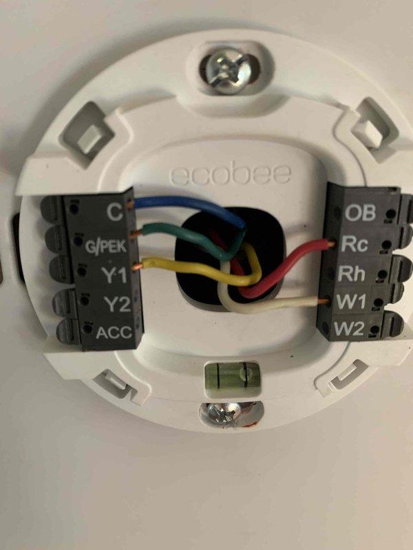 Responded to install callback for high humidity concerns following recent air conditioning system installation. Verified refrigerant charge levels and system operation, confirmed proper ecobee thermostat wiring and configuration for humidity control settings. System found operating within manufacturer specifications with adequate refrigerant levels; reviewed thermostat programming with occupant to optimize dehumidification performance during cooling cycles.