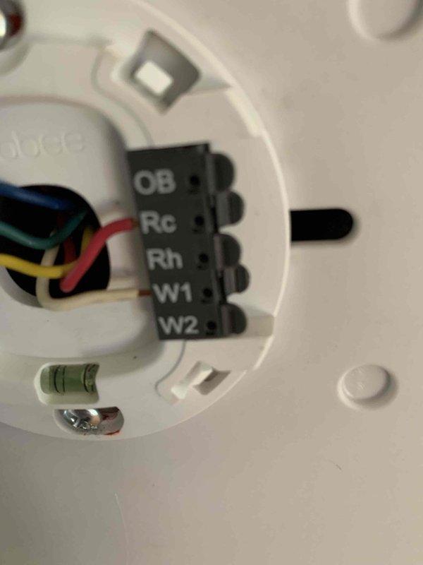 Responded to install callback for high humidity concerns following recent air conditioning system installation. Verified refrigerant charge levels and system operation, confirmed proper ecobee thermostat wiring and configuration for humidity control settings. System found operating within manufacturer specifications with adequate refrigerant levels; reviewed thermostat programming with occupant to optimize dehumidification performance during cooling cycles.
