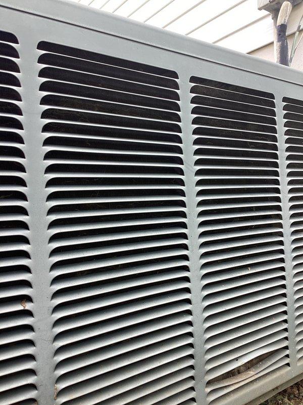 Responded to no cooling complaint on 10+ year old unit located in side yard. Upon arrival, found condenser coil heavily soiled with dirt and debris accumulation, significantly restricting airflow and reducing heat transfer efficiency. Performed thorough coil cleaning to restore proper airflow and system capacity. Unit tested after service and confirmed cooling operation restored to normal parameters.