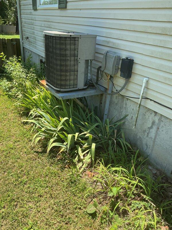 Responded to no cooling complaint with reported weak airflow. Upon arrival, performed system diagnostics on residential split system heat pump. Inspected outdoor condensing unit mounted on exterior wall and indoor air handler with upflow furnace configuration. Evaluated air filter condition, refrigerant levels, electrical connections at disconnect box, and condensate drain line operation. Verified proper airflow through supply and return ductwork. System brought back to normal operating parameters with adequate cooling capacity and airflow restored.