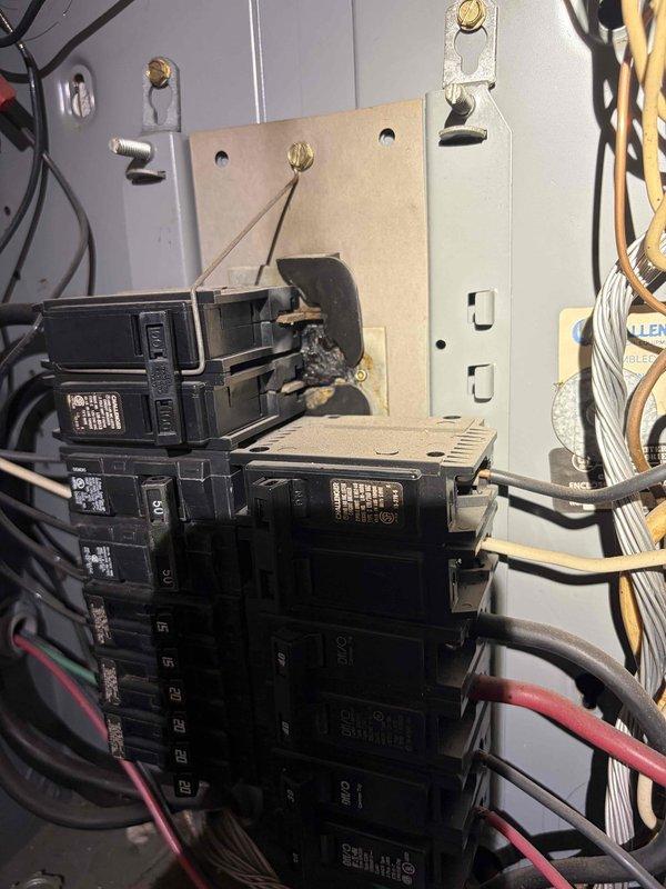 Installed box extension at electrical panel to accommodate new HVAC disconnect connection. Verified proper clearances and mounting to ensure safe hookup point for HVAC contractor's equipment installation.