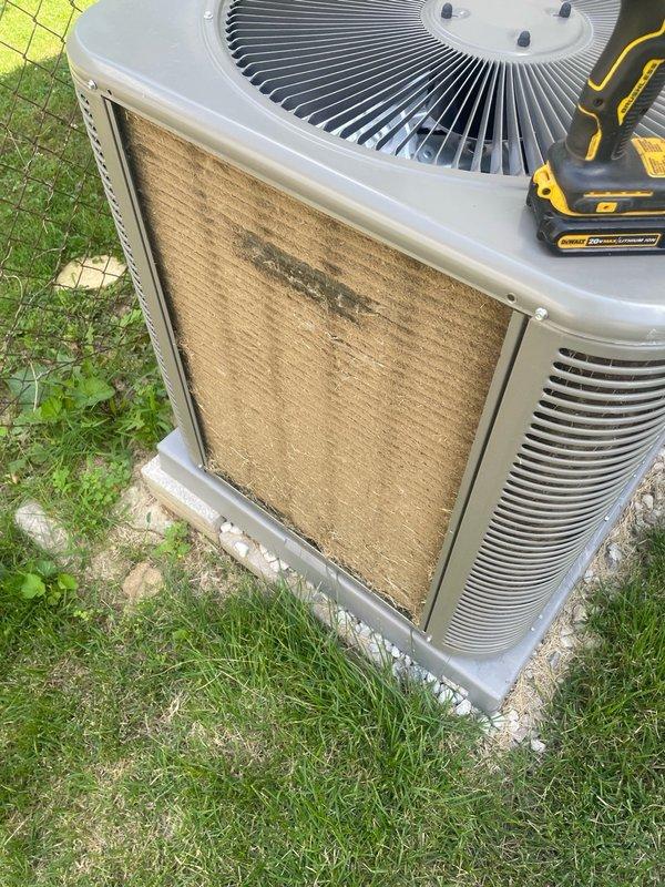 Responded to no-cool complaint on recently installed system where thermostat would not cool below 80 degrees. Upon arrival, performed diagnostic inspection of outdoor condenser unit and found heavily soiled air filter restricting airflow to the system. Cleaned and serviced the condenser unit, addressing the clogged filter that was preventing proper heat exchange and limiting cooling capacity. System tested and confirmed operational, now cooling properly below 80 degrees as designed.