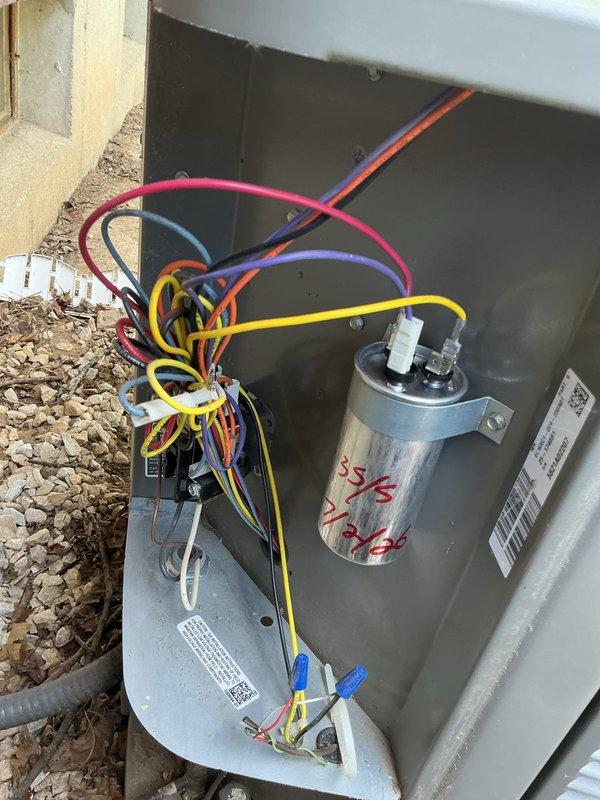 Responded to no cooling complaint with indoor temperature in the 80s. Upon inspection of the 10-year-old outdoor unit, discovered severely clogged air filter restricting airflow to the system. Removed and replaced contaminated filter which was heavily loaded with dust, dirt, and debris. Inspected electrical components including contactor and capacitor, verified all wiring connections secure. System restored to proper cooling operation.