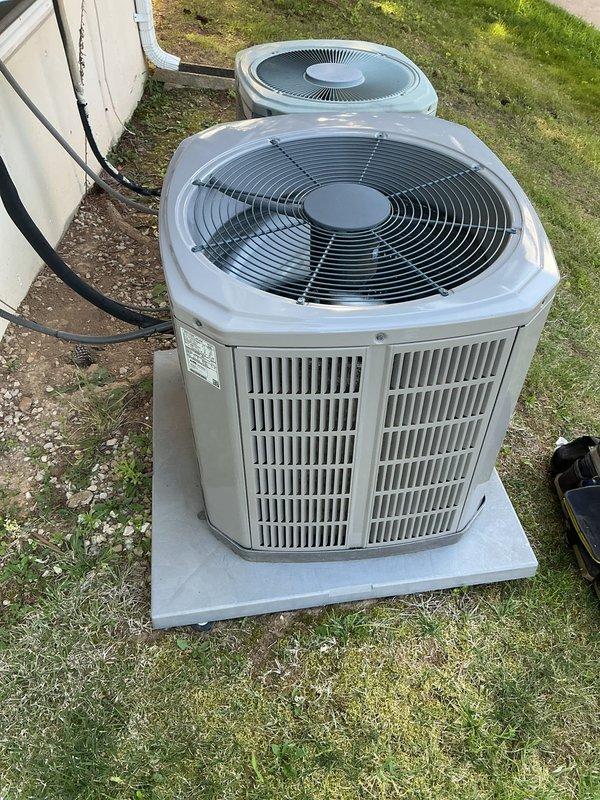 Responded to no cooling complaint on 10+ year old residential air conditioning system located at side of home. Upon arrival, performed visual inspection of outdoor condenser unit and discovered significant dirt and debris accumulation on condenser coil fins, restricting proper airflow and heat transfer. Cleaned condenser coil, removed obstructions from grille openings, and verified system operation. Unit restored to proper cooling function with improved airflow through heat exchanger. Recommended regular maintenance to prevent future efficiency loss.