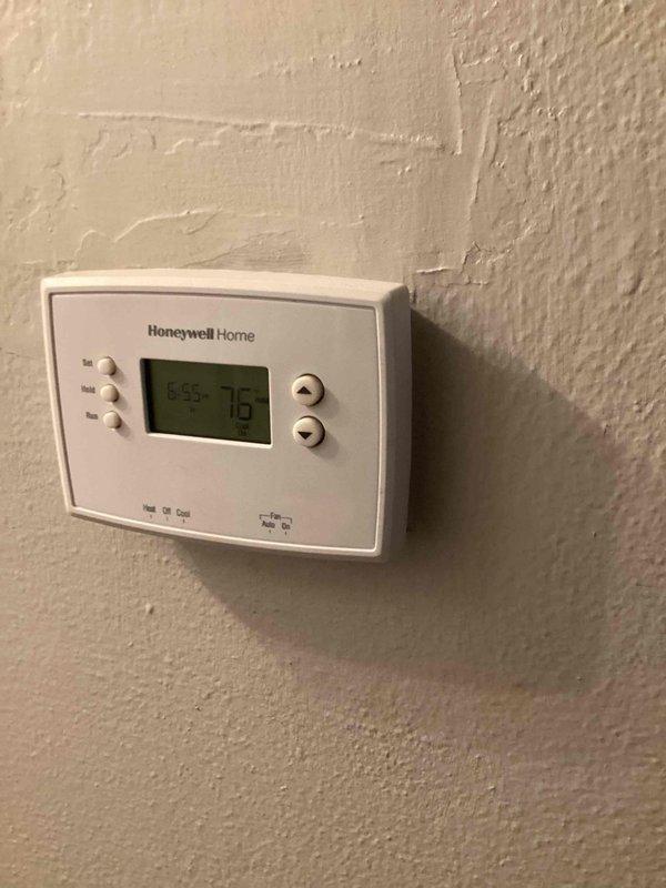 Responded to no cool call on Ruud outdoor condensing unit located on side of home. Customer reported AC blowing cool but not achieving adequate temperature throughout home and suspected low refrigerant charge. Customer had previously cleaned evaporator coil and blower assembly prior to service visit. Upon arrival, performed complete system diagnostic including temperature differential measurements, visual inspection of outdoor unit, and thermostat functionality check. Thermostat displaying 78°F at time of service. Conducted refrigerant charge analysis and pressure testing to determine if system was operating within manufacturer specifications. Evaluated airflow, compressor operation, and overall system performance to identify root cause of insufficient cooling capacity.