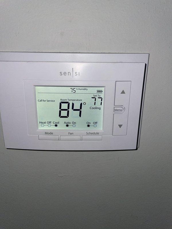 Responded to no cooling call on 3-year-old Lennox system. Upon arrival, found thermostat displaying 84°F room temperature with setpoint at 77°F and system calling for cooling. Performed diagnostic testing using capacitor analyzer on outdoor unit. Identified failed dual run capacitor preventing compressor and condenser fan operation. Replaced defective capacitor with OEM equivalent, verified proper microfarad readings and voltage supply. Cycled system through complete cooling cycle, confirmed compressor engagement, proper refrigerant pressures, and condenser fan operation. Verified thermostat satisfied cooling demand and system operating within manufacturer specifications. Unit restored to full cooling capacity.
