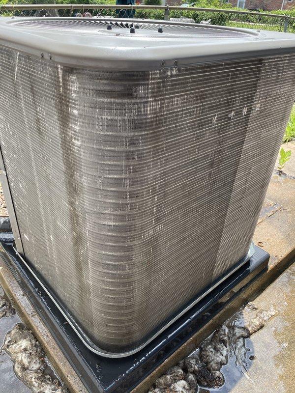 Responded to no cooling complaint on residential air conditioning system. Upon arrival, found outdoor condenser unit operational but severely restricted return airflow due to heavy dust, lint, and debris accumulation in return air grille. Documented excessive buildup blocking airflow through vent openings, which was causing reduced system performance and insufficient cooling. Inspected outdoor condenser unit and confirmed proper operation with no visible mechanical issues. Advised customer that clogged return air grille was primary cause of cooling deficiency and recommended immediate cleaning of all return air vents and replacement of air filter to restore proper system airflow and cooling capacity.