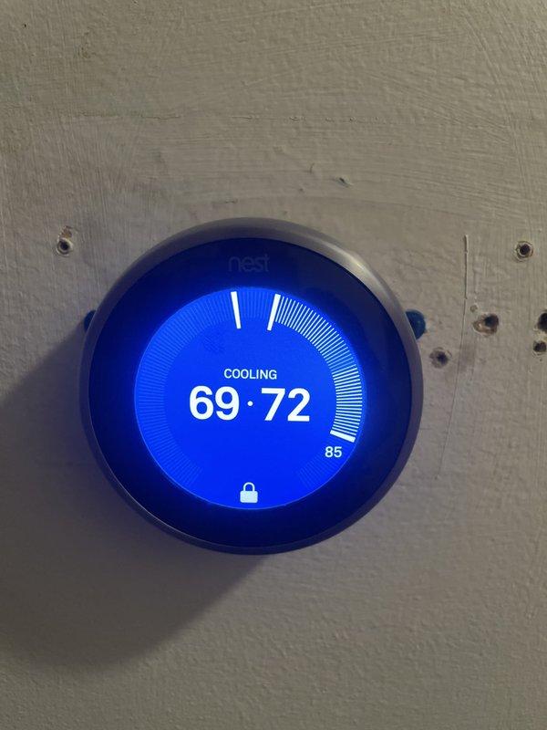 Responded to no cooling call on 15-year-old residential AC unit. Upon arrival, found system not operating due to blown fuses in exterior disconnect box. Replaced both 50-amp FLNR time-delay fuses and restored power to unit. Verified thermostat calling for cooling and system responding properly with unit cycling on and achieving target temperature of 72°F. System tested and left operational.