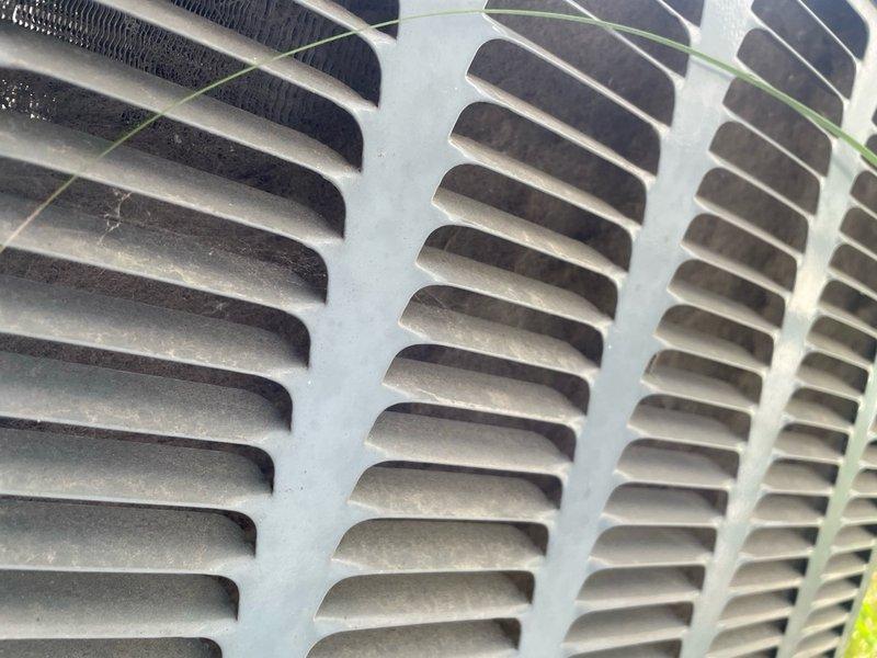 # HVAC Service Report - No Cool Call

Responded to no cooling complaint on 13-year-old residential air conditioning system. Upon arrival, performed complete system diagnostic including visual inspection of outdoor condenser unit, electrical component testing, and refrigerant pressure analysis. Condenser unit exterior showed normal weathering consistent with age, with louvers and grilles intact but displaying accumulated debris and dust buildup from outdoor exposure.

Identified failed compressor as root cause of complete system failure. Compressor tested with no electrical continuity and showed no attempt to start during diagnostic procedures. Verified proper voltage supply to unit, confirmed contactor operation, and ruled out capacitor failure through testing. Run capacitor tested within acceptable range, and all safety controls functioning properly.

Due to age of system and cost-effectiveness analysis, recommended full system replacement rather than compressor replacement on 13-year