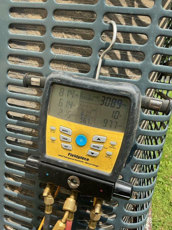 Responded to no cooling call with ice formation on refrigerant lines. Upon arrival, performed diagnostic testing using digital manifold gauges and temperature measurements on 6-year-old air conditioning system. Readings indicated abnormal temperature differentials and refrigerant pressures consistent with restricted airflow or low refrigerant charge. Conducted thorough system evaluation including supply/return air temperatures and refrigerant operating pressures to identify root cause of ice buildup and insufficient cooling performance.