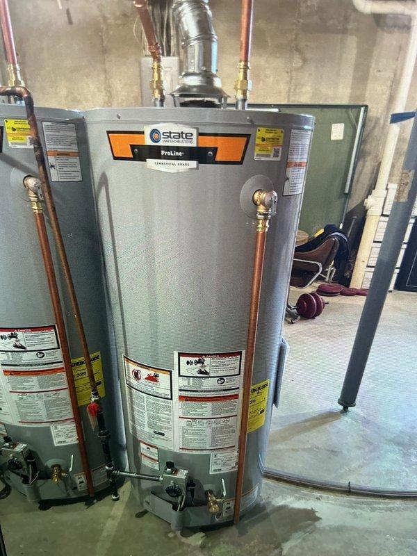 Completed warranty replacement of 50-gallon gas tall water heater with State ProLine unit. Removed manufacturer stickers from existing equipment as requested, connected copper supply lines with brass fittings, and installed proper venting system. All plumbing connections tested and verified operational with no leaks detected.