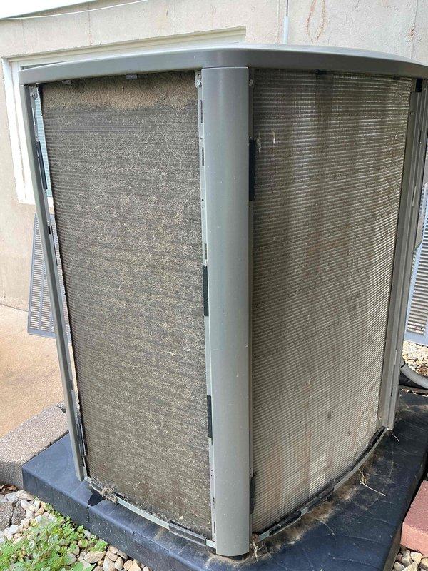 Completed comprehensive cooling maintenance tune-up on a 9-year-old air conditioning system. Unit was operational upon arrival with exterior condenser coils showing heavy accumulation of dirt, dust, and debris significantly restricting airflow. Performed thorough cleaning of condenser coils, checked refrigerant levels, inspected electrical connections, tested capacitor and contactor operation, verified proper amperage draw on compressor and fan motor, cleaned condensate drain line, replaced air filter, and confirmed system cooling performance within manufacturer specifications.
