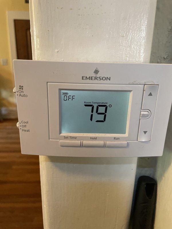 Responded to recall for no cooling condition on unit U10 located at back of residence. Upon arrival, found thermostat displaying 79°F with system in OFF mode. Verified customer had shut down system as previously advised due to recurring cooling failure. Documented thermostat settings and current temperature readings showing unit not operating in cooling mode. Further diagnostics required to identify root cause of repeat no-cooling condition.