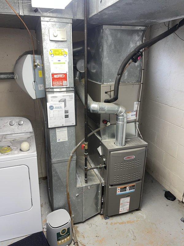 Responded to no cool air complaint on Unit 10. Upon arrival, inspected Lennox furnace system in basement and Carrier outdoor condenser unit. Condenser showed signs of weathering with visible dirt accumulation and algae growth on concrete pad indicating drainage concerns. Performed diagnostic evaluation of refrigerant lines, electrical connections, and compressor operation. Verified thermostat communication and airflow through indoor air handler. System operational at time of departure with cooling restored.