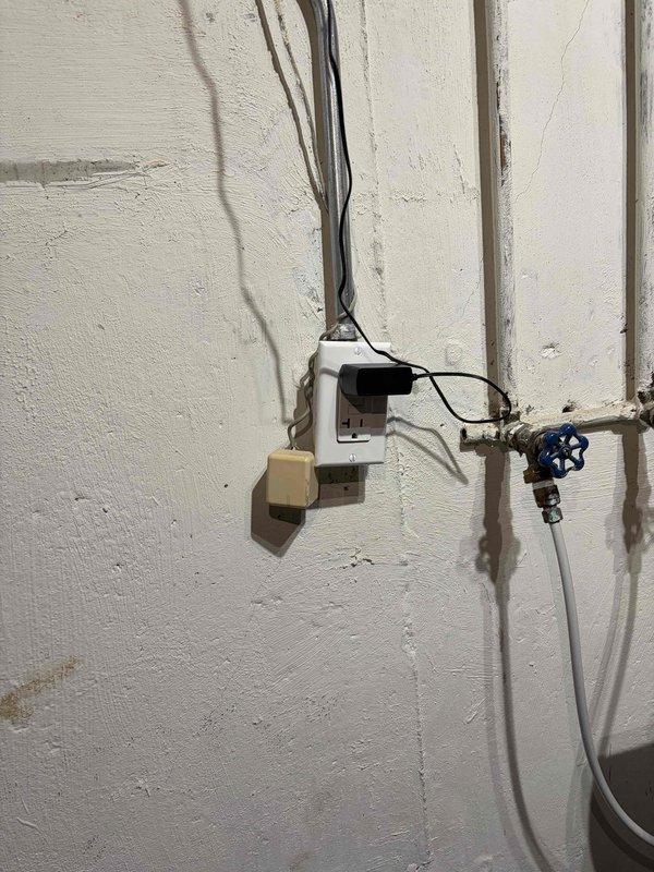 Completed electrical panel replacement with installation of new circuit breaker panel box and organized circuit distribution system. Installed surge protection device to safeguard electrical system from voltage spikes and power surges. All circuits were properly labeled, connections secured, and panel mounted to exterior wall with appropriate conduit routing for service entrance conductors.
