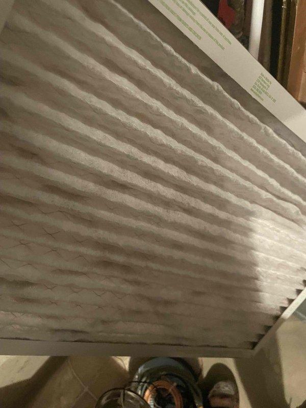 Completed comprehensive cooling season tune-up on 8-year-old air conditioning system located in basement. Performed full system inspection including blower assembly, motor operation, and electrical connections; all components found operating within normal parameters. Inspected air filter showing moderate dust accumulation and recommended replacement to maintain optimal airflow and system efficiency.