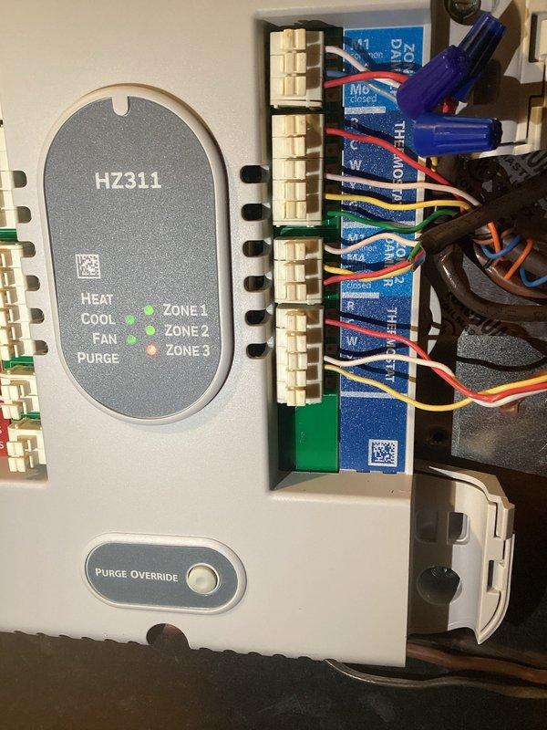 Responded to callback for no airflow following recent control board replacement. Upon arrival, indoor temperature had risen to 80 degrees with no air circulation. Inspected HZ311 zone control system and associated damper controls, verified proper wiring connections at terminal strips and relay modules, and tested zone damper operation. Restored system functionality, confirmed airflow to all zones, and verified proper cooling operation before departure.