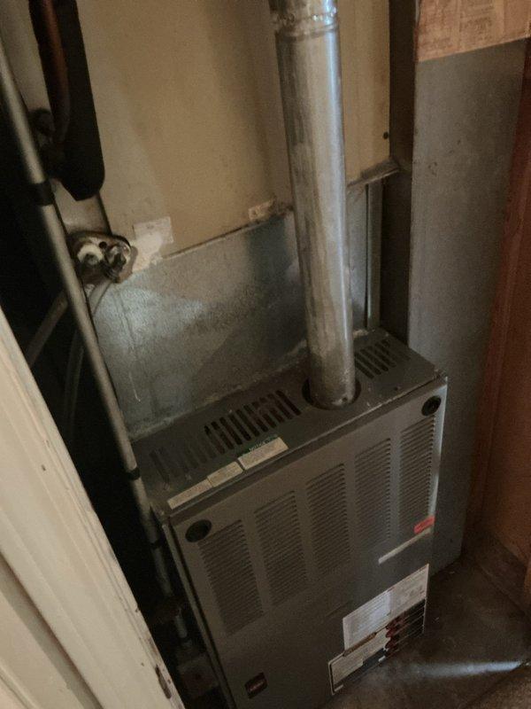 Responded to no cooling call on 20-year-old residential air conditioning system. Upon arrival, confirmed outdoor condenser unit was not operating and indoor system had no airflow. Performed diagnostic evaluation of both outdoor condensing unit and indoor air handler. Inspected electrical connections, tested capacitor values, and checked refrigerant pressures. Evaluated compressor functionality and verified thermostat communication. Due to age of equipment and extent of failure, discussed system condition and repair versus replacement options with homeowner. Unit showed significant weathering and wear consistent with two decades of operation. Documented equipment condition with photos for customer records.