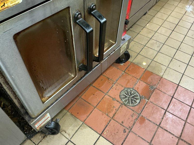 Responded to commercial kitchen clogged drain call during business hours. Upon arrival, located floor drain in kitchen prep area beneath stainless steel equipment. Cleared obstruction from drain line using appropriate plumbing tools, restoring proper drainage flow. Tested drain functionality and confirmed complete clearance with no backup or slow drainage issues remaining.