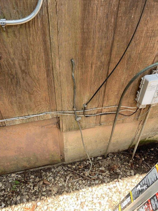 Conducted electrical assessment for dryer outlet replacement and bedroom outlet experiencing incorrect voltage issues. Inspection revealed aged electrical infrastructure with deteriorated circuit breaker panel showing significant rust and wear, along with exterior wiring requiring attention. Provided estimate for complete outlet replacement and rewiring of affected circuits to restore proper voltage and ensure safe electrical operation throughout the residence.