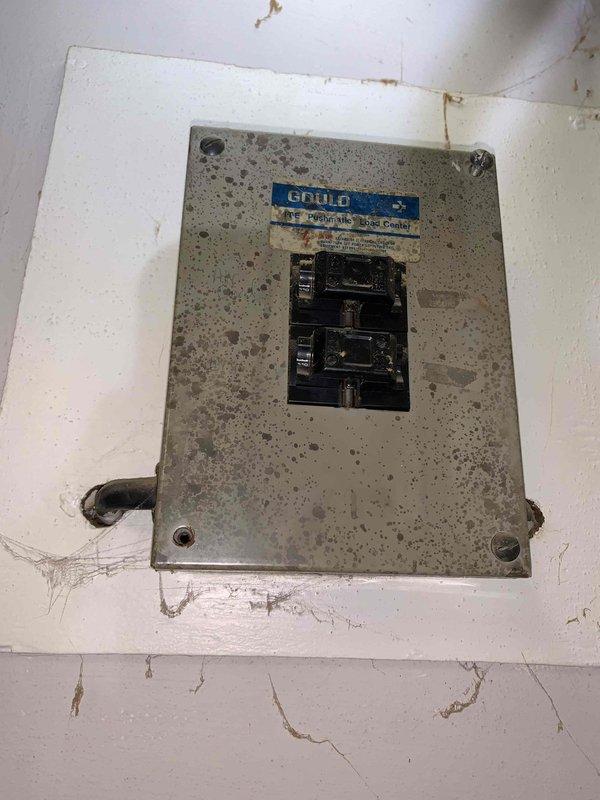 Conducted electrical assessment for dryer outlet replacement and bedroom outlet experiencing incorrect voltage issues. Inspection revealed aged electrical infrastructure with deteriorated circuit breaker panel showing significant rust and wear, along with exterior wiring requiring attention. Provided estimate for complete outlet replacement and rewiring of affected circuits to restore proper voltage and ensure safe electrical operation throughout the residence.