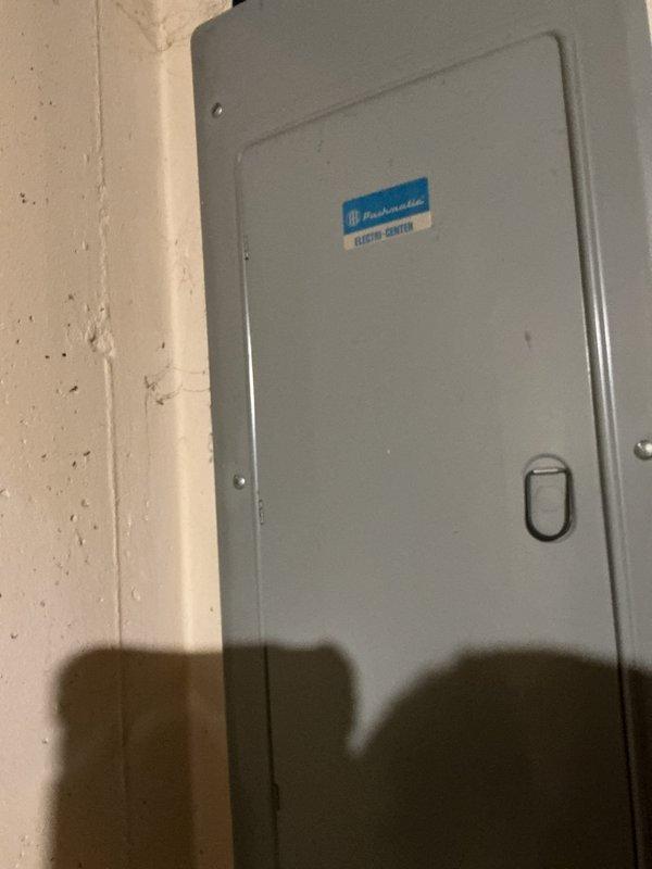 Conducted site assessment for electric vehicle charging station installation requiring power distribution from basement electrical panel to main floor garage. Evaluated existing electrical infrastructure, including main service panel capacity and circuit breaker configuration, to determine feasibility of adding dedicated EV charger circuit. Documented current panel layout and available breaker spaces to develop comprehensive quote for running new electrical service between floors.