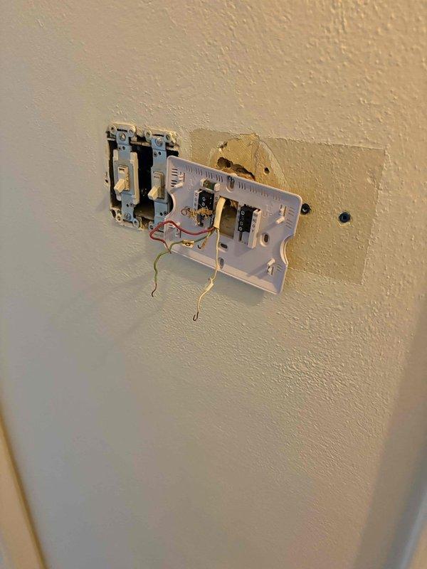 Responded to service call for thermostat replacement on single ground-level HVAC unit located in rear of property. Removed existing thermostat and assessed electrical connections and wall mounting conditions. Completed installation of new digital thermostat, secured all wiring connections, and verified proper operation with system controls.