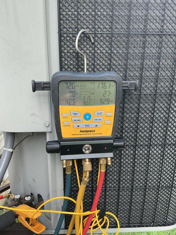 Responded to service call for refrigerant addition on residential air conditioning unit located at side of home. Upon arrival, performed complete system diagnostics using digital gauge manifold to measure operating pressures and temperatures across the system. Evaluated airflow at supply ductwork using clamp meter to verify proper amperage draw and system performance. Connected manifold gauges to service ports and assessed refrigerant charge levels, confirming system was operating below optimal capacity. Added appropriate amount of refrigerant to restore system to manufacturer specifications and verified proper cooling operation before departure.