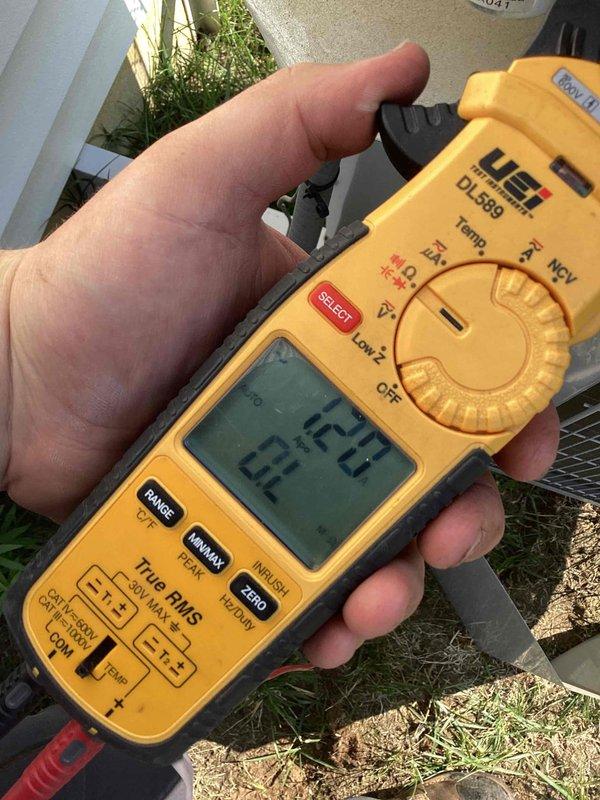 Completed comprehensive tune-up service on Carrier outdoor air conditioning unit. Performed standard maintenance inspection, verified system operational parameters using digital clamp meter with readings of 124V and 62A, and confirmed unit is operating within manufacturer specifications. Unit exterior and condenser coil grille are in clean, well-maintained condition with no visible damage or deterioration noted.