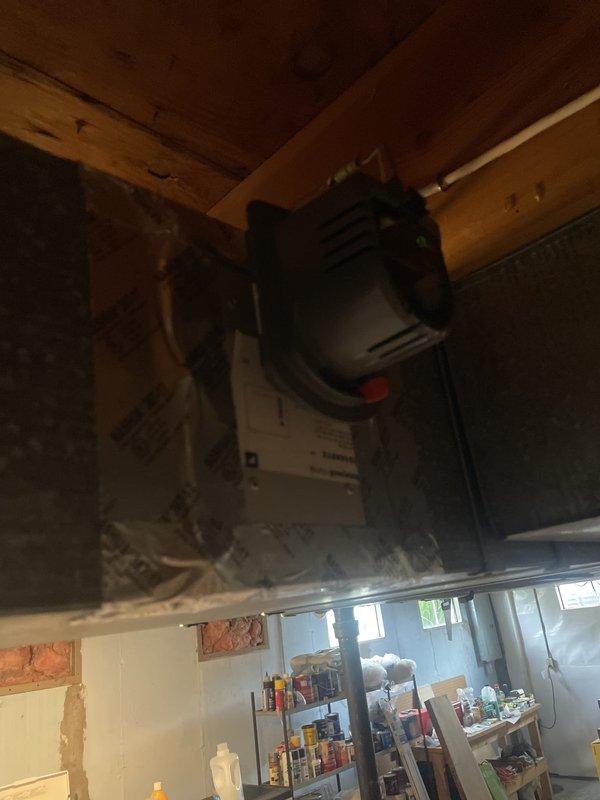 Responded to service call for sound complaint and dehumidification malfunction on recently installed S40 system. Inspected Honeywell zone control damper in attic space and verified proper wiring connections and operational status of zone controller. Evaluated system operation, identified issue with dehumidification settings, and adjusted controls to resolve performance concerns. Verified garage door opener interference was not affecting HVAC operation. System tested and confirmed operating within normal parameters with proper dehumidification function restored.