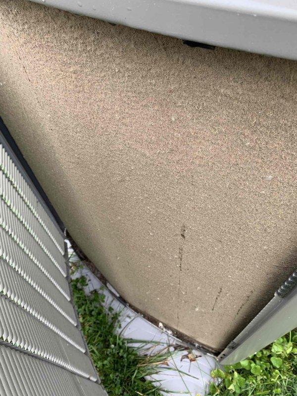 Performed diagnostic service on 1-year-old residential air conditioning system experiencing excessive condensation issues and resulting air filter clogging. Upon inspection, discovered significant moisture accumulation on indoor HVAC ductwork and equipment surfaces, with visible water droplet formation indicating improper temperature differential or airflow concerns. Evaluated refrigerant charge levels, inspected condensate drainage system, and assessed indoor air handler and outdoor ground-level condenser unit operation. Documented conditions with photographic evidence showing condensation on metal ductwork panels and exterior unit installation. Contacted customer to review diagnostic findings and discuss recommended repairs to resolve moisture-related performance issues affecting system efficiency and indoor air quality.