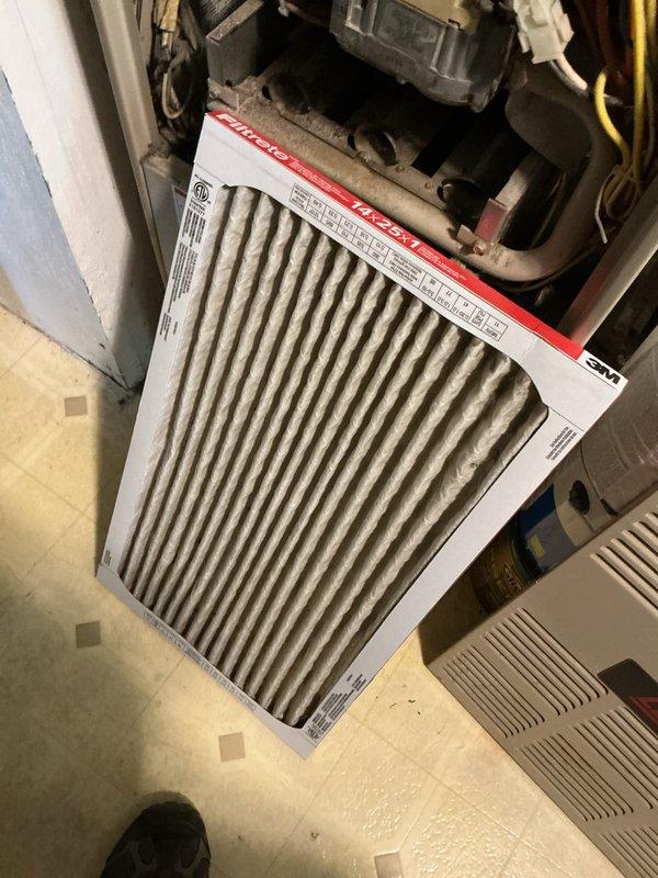Responded to evening service call for newly installed system experiencing uneven cooling and inconsistent room temperatures. Performed diagnostic evaluation on ground-mounted unit located at rear of property. Connected manifold gauges to verify refrigerant charge and system pressures on recently commissioned equipment. Inspected air handler and replaced heavily soiled air filter that was restricting airflow. Advised customer on proper filter maintenance schedule and confirmed system operational parameters within manufacturer specifications.
