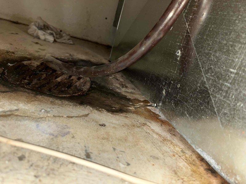 Responded to water leak from HVAC equipment in basement. Upon arrival, found evidence of significant moisture damage to wooden structures and copper piping showing deterioration from prolonged water exposure. Deployed air mover and dehumidifier to begin drying affected hallway area and mitigate further moisture damage. Inspected 6-year-old system components and identified source of leak. Documented conditions with photos showing extent of water damage to surrounding materials and compromised building envelope where mechanical systems are located.