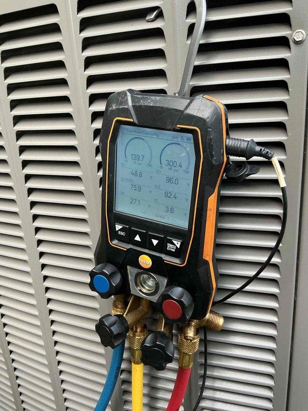 # HVAC Service - No Cool U10

Responded to no cooling complaint on single outdoor condensing unit. Upon arrival, performed comprehensive system diagnostics using digital manifold gauges to measure refrigerant pressures and temperatures across the system. Suction pressure reading of 139.7 PSI and liquid line pressure of 300.4 PSI were recorded, along with temperature differentials showing 48.8°F suction temperature and superheat reading of 27.1°F. System evaluation revealed abnormal operating parameters indicating potential refrigerant charge issues or airflow restrictions. Utilized Fieldpiece digital instruments to verify superheat and subcooling calculations, confirming system was not operating within manufacturer specifications. Additional measurements showed discharge air temperature of 75.9°F and return air temperature of 92.4°F, with a temperature split of only 3.6°F, well below the expected 15-20°F differential for proper cooling operation. 

Conducted thorough inspection of atti