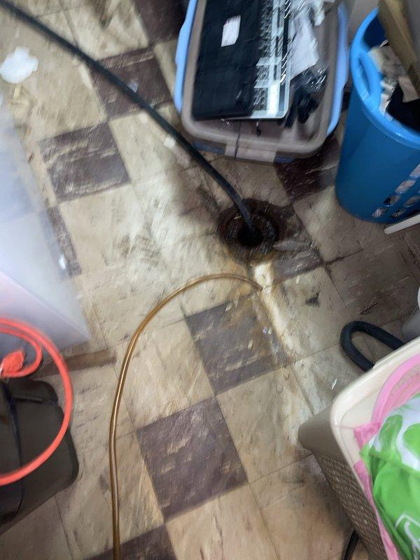 Responded to service call for multiple water leak issues affecting 16-year-old HVAC system and boiler. Conducted comprehensive inspection of air conditioning unit, boiler piping system, and plumbing fixtures. Identified active leak in boiler pipe connection beneath flooring in basement utility area, with evidence of water damage and aging PVC piping requiring attention. Inspected AC condensate drainage system and evaporator coil area for source of reported air conditioning leak. Documented conditions of all affected systems through photographic evidence showing deteriorated piping, worn connections, and water intrusion points. Assessed toilet fixture reported as malfunctioning during same visit. Provided detailed estimates for both repair options and full system replacement alternatives to allow customer comparison of solutions for aging equipment.