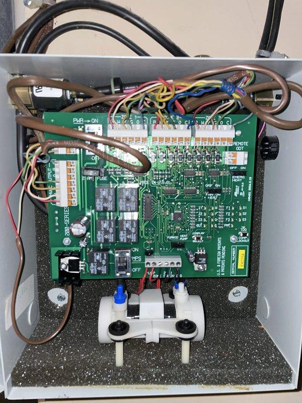Responded to no cooling complaint on 4-month-old system with blank thermostat displays. Upon arrival, found Nest thermostats were not communicating with HVAC control board. Inspected main control board assembly and verified all wire terminations at board-level connector blocks were secure. Removed Nest thermostat from wall plate to examine back panel connections and confirm proper C-wire power supply configuration. Reinstalled thermostat, verified 24VAC power at terminals, and confirmed system restored normal operation with proper communication between thermostats and equipment. System tested in cooling mode with satisfactory performance.