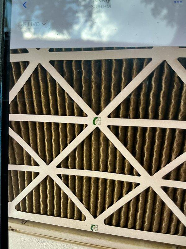 Responded to no-cooling complaint on less than one-year-old Lennox unit originally installed by Classic Aire Care. Upon inspection, discovered severely restricted airflow due to heavily soiled air filter with significant dirt and debris accumulation throughout pleated media. Replaced dirty filter with new unit, restoring proper airflow to system. Verified system operation and confirmed adequate cooling restored to entire home. Documented filter condition with photos showing extreme contamination level for unit age. Recommended establishing regular filter maintenance schedule to prevent future system failures.