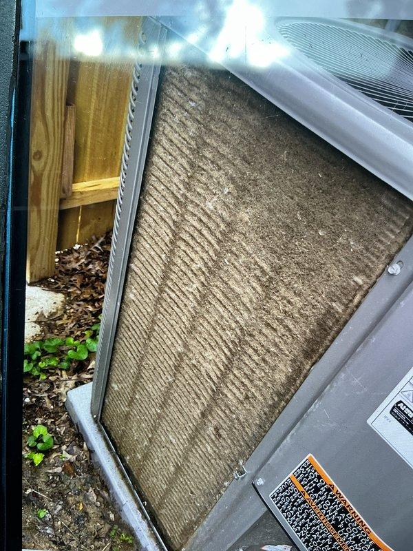 Responded to no-cooling complaint on less than one-year-old Lennox unit originally installed by Classic Aire Care. Upon inspection, discovered severely restricted airflow due to heavily soiled air filter with significant dirt and debris accumulation throughout pleated media. Replaced dirty filter with new unit, restoring proper airflow to system. Verified system operation and confirmed adequate cooling restored to entire home. Documented filter condition with photos showing extreme contamination level for unit age. Recommended establishing regular filter maintenance schedule to prevent future system failures.