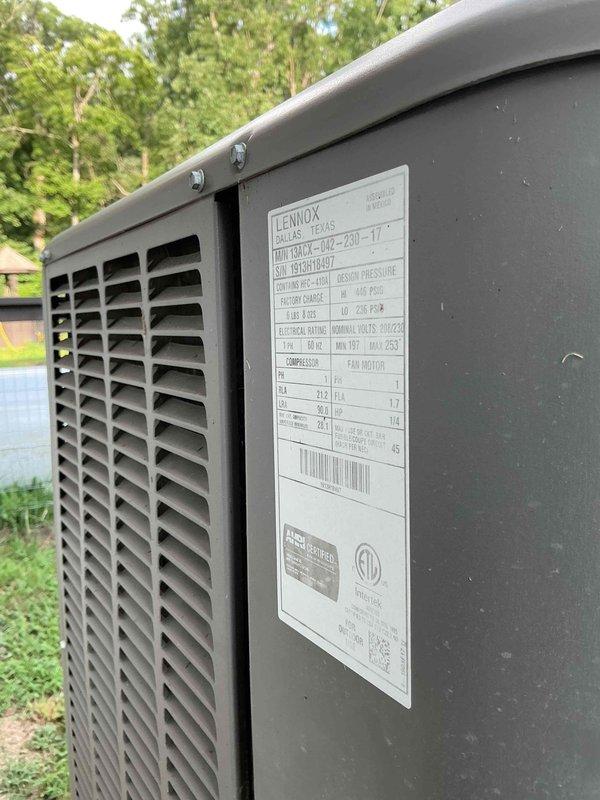 Responded to no cooling complaint on 10+ year old Lennox residential air conditioning system located on side of home. Upon arrival, found outdoor condenser unit not operating while indoor fan was running as instructed. Performed diagnostic evaluation of electrical components and refrigerant system. Identified failed component preventing compressor operation. Replaced defective relay/contactor assembly, restored power to compressor, and verified proper system operation with normal cooling restored.